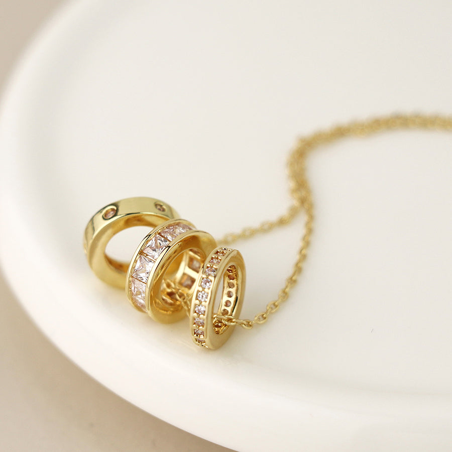 Pom Faux Gold Triple Mini Crystal Rings Necklace