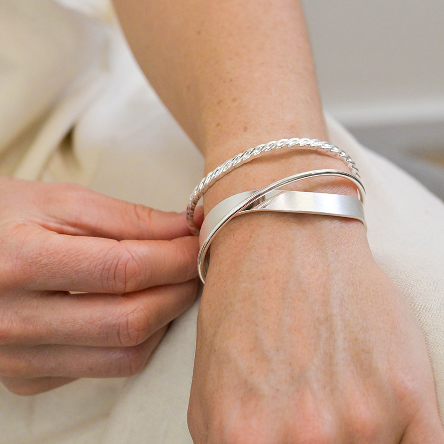 POM Silver Plated Brushed and Smooth Twist Bangle