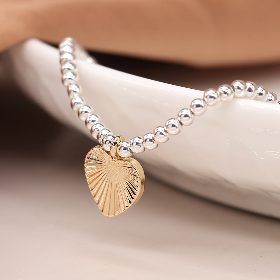 Beaded Bracelet with Faux Gold Textured Heart Charm