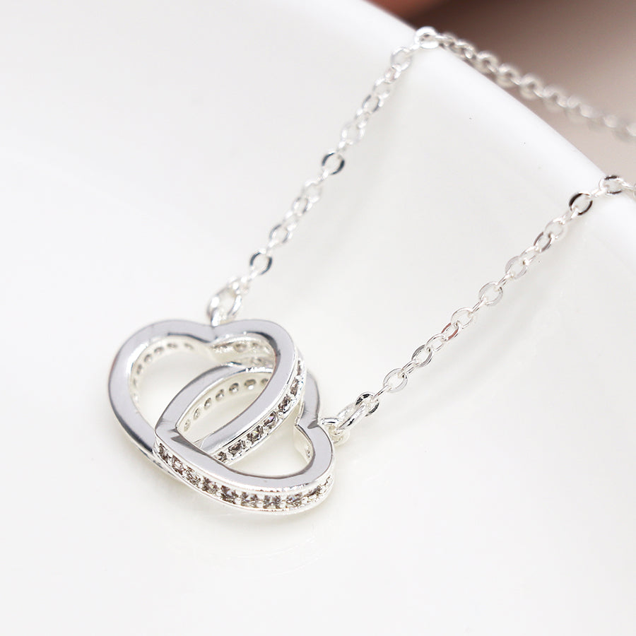 Silver Plated Crystal Edged Linked Hearts Necklace