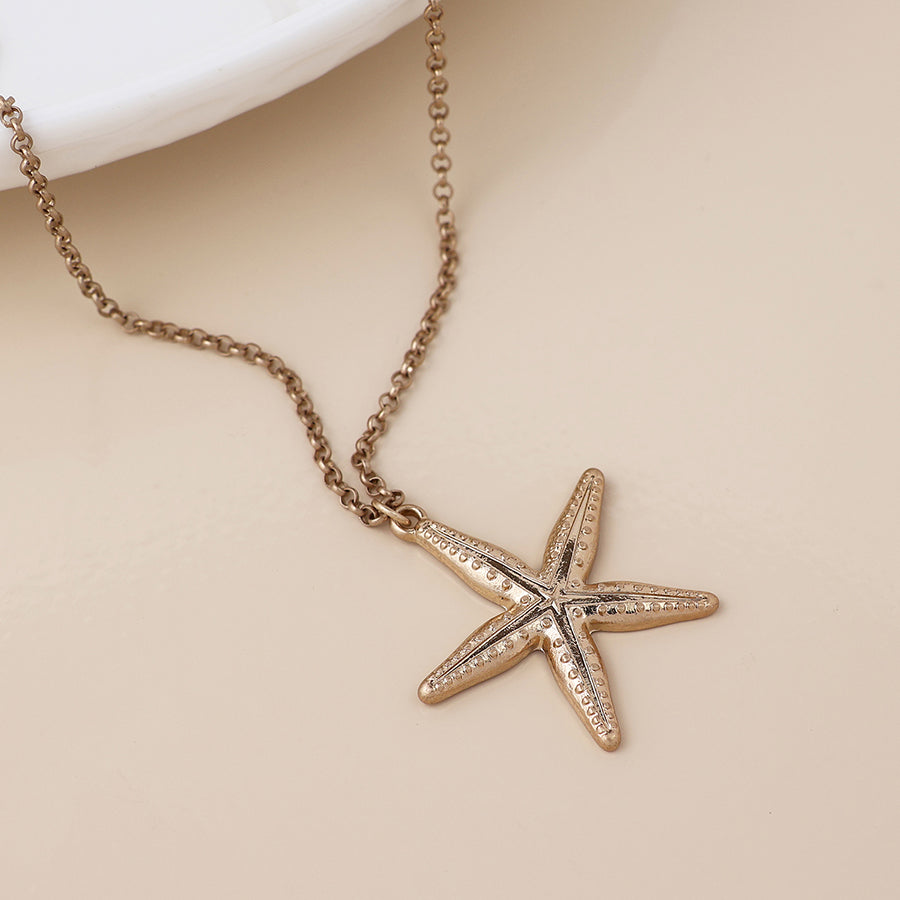POM Golden starfish necklace