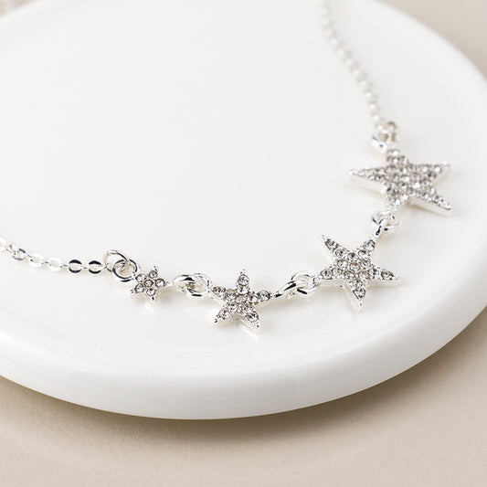 Pom Silver Plated Crystal Graduated Stars Necklace