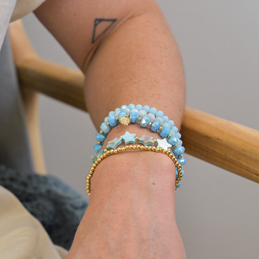 POM Blue and Gold Bead Bracelet Stack with Gold Shell Charm