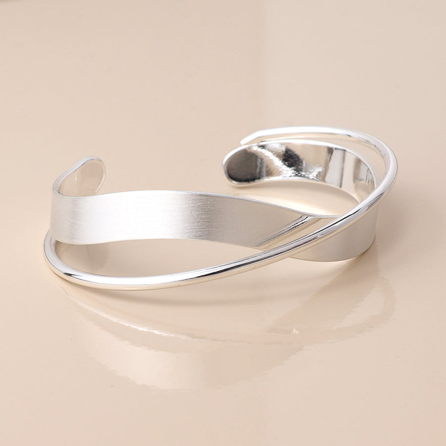 POM Silver Plated Brushed and Smooth Twist Bangle