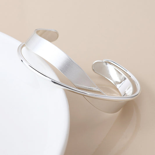 POM Silver Plated Brushed and Smooth Twist Bangle