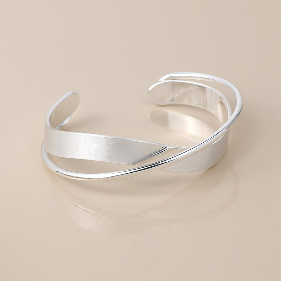 POM Silver Plated Brushed and Smooth Twist Bangle