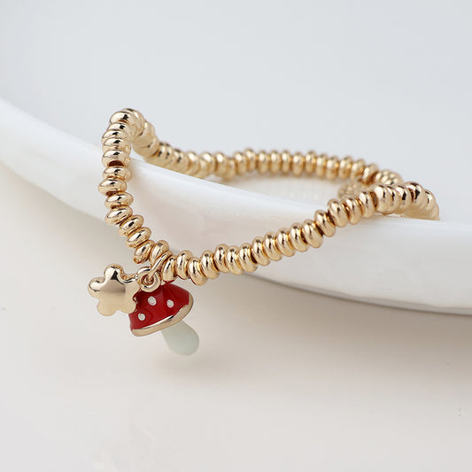POM Golden Flower and Toadstool Charm Stretch Bracelet