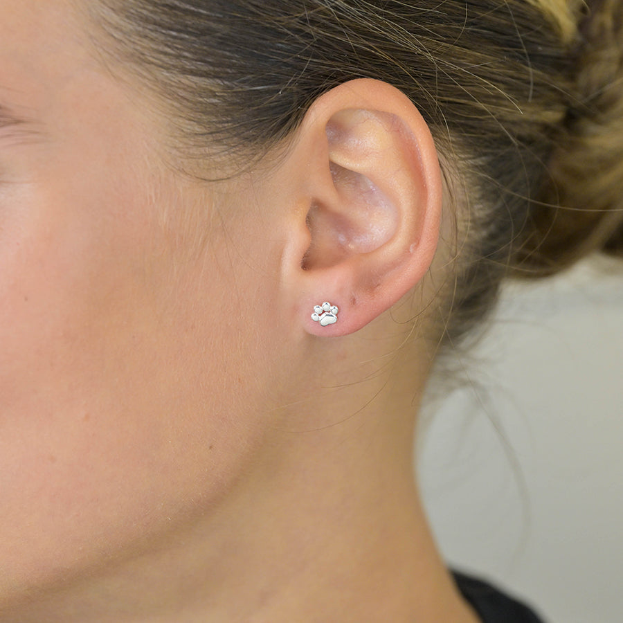 POM Tiny sterling silver paw print earrings