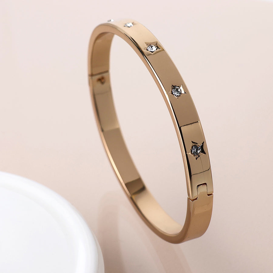 POM Golden crystal stars hinged bangle