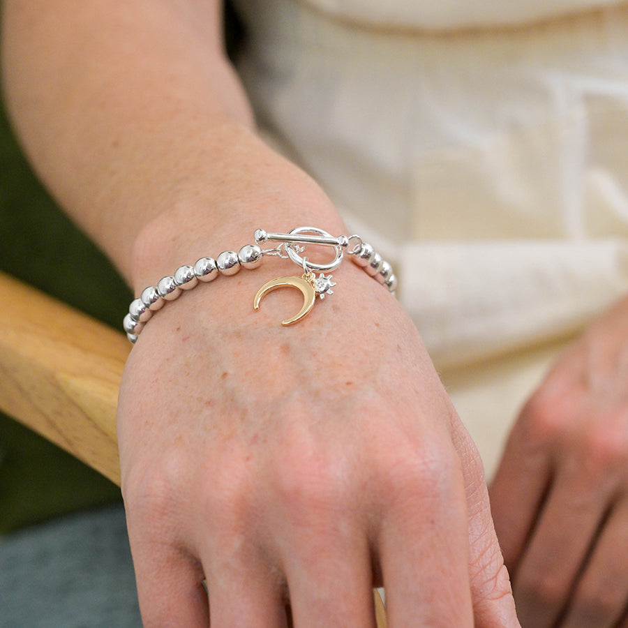 POM Silver plated bead, little sun and gold moon charm bracelet