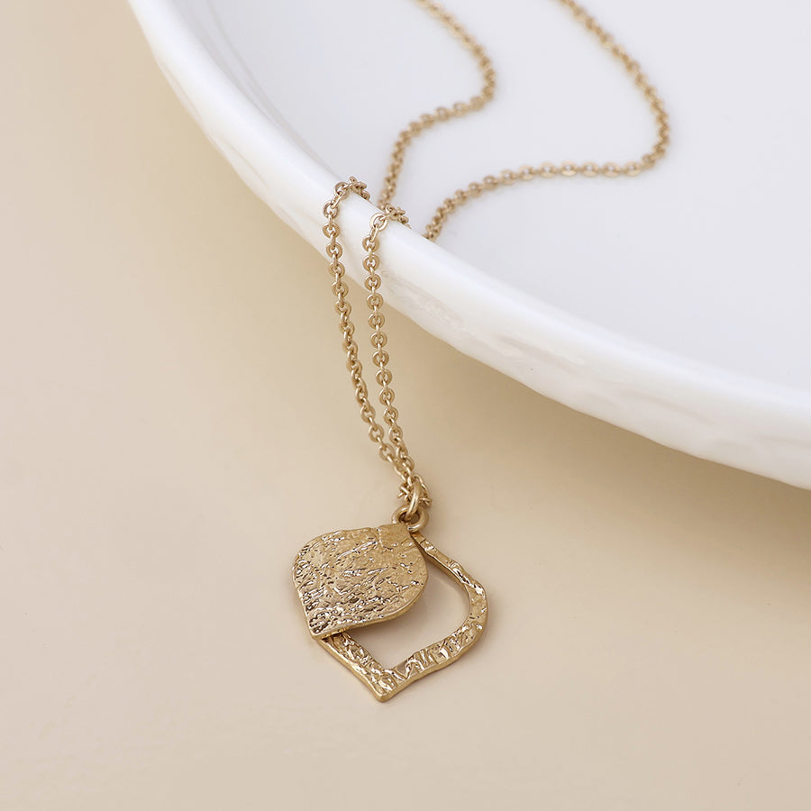 POM Halo golden foil textured layered leaf necklace
