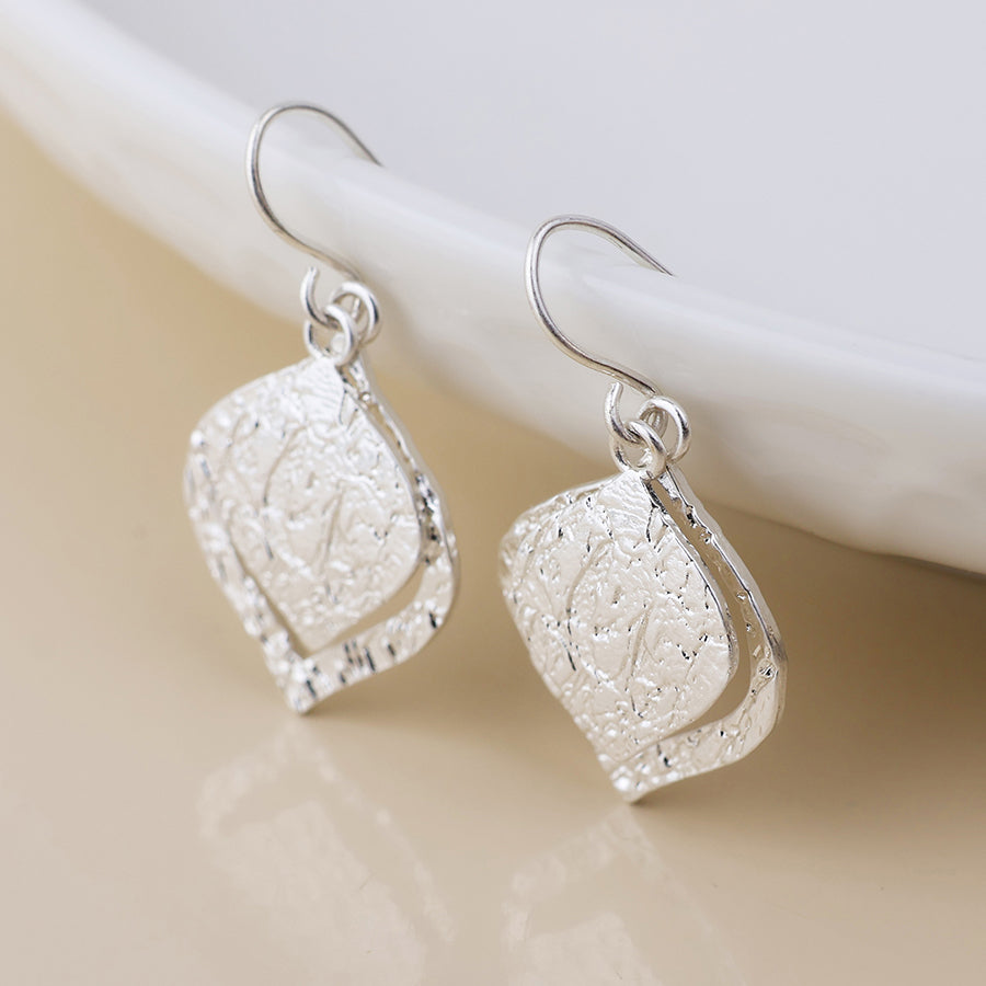 POM Halo Silver foil textured layered leaf drop earrings