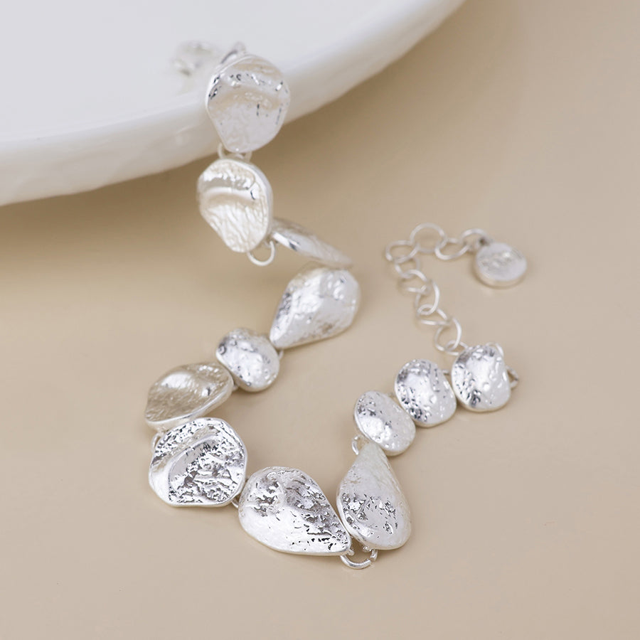 POM Molten silver plated molten organic worn drops bracelet