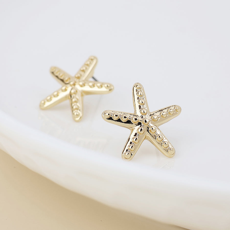 POM Golden single starfish stud earrings