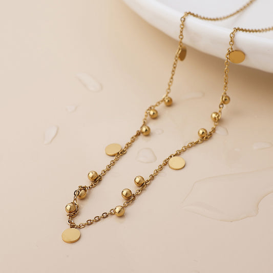 POM Waterproof gold plated bead and disc charm necklace