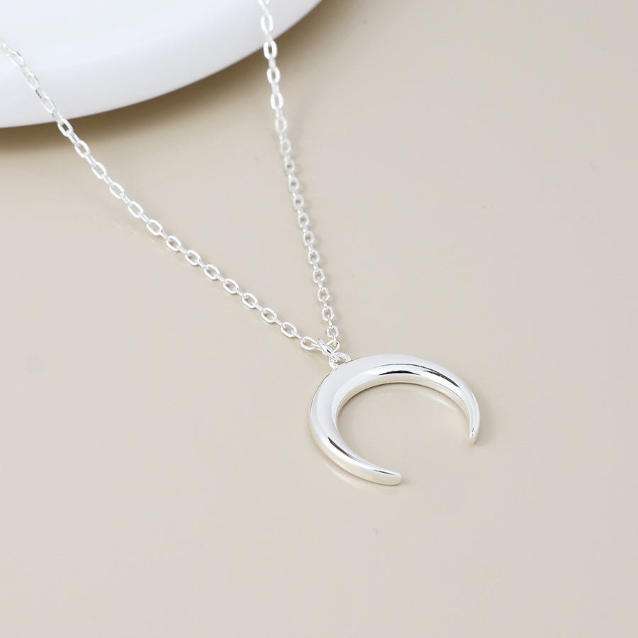 POM Sterling silver simple crescent moon necklace