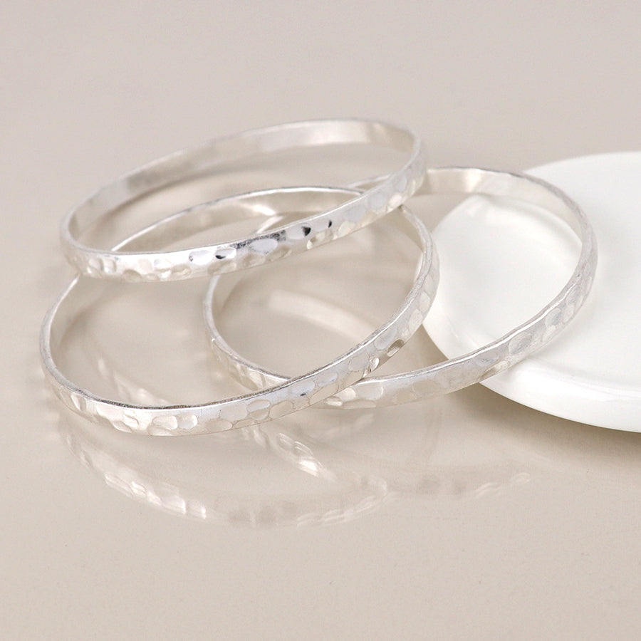 POM Silver plated worn triple bangle set