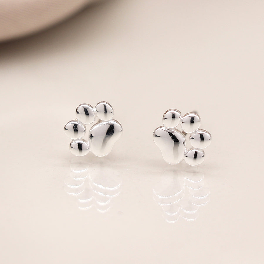 POM Tiny sterling silver paw print earrings