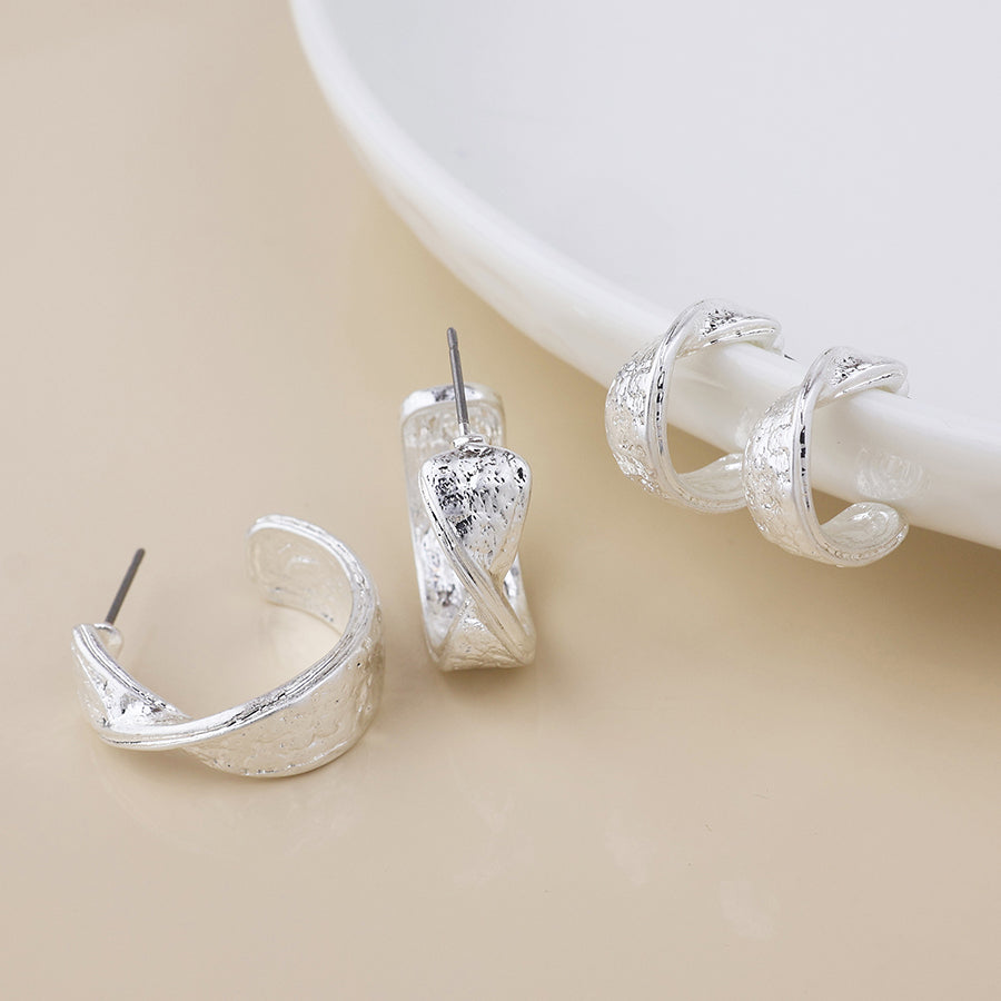 POM Molten silver plated worn textured twist hoop duo