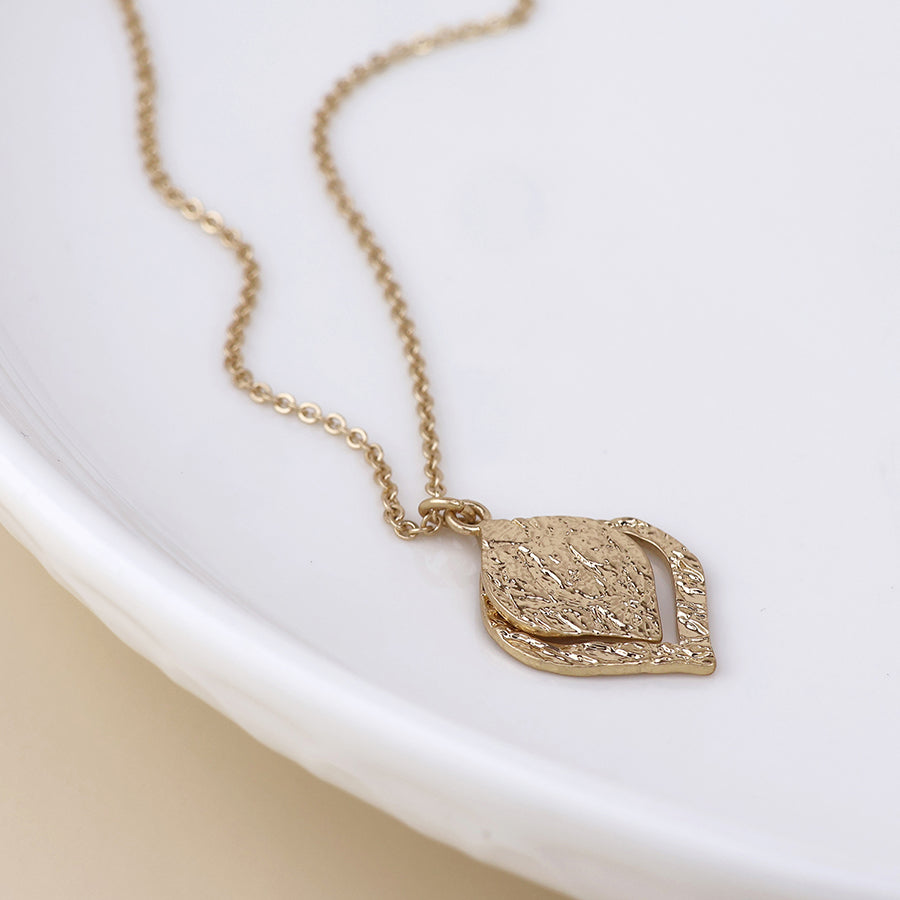 POM Halo golden foil textured layered leaf necklace