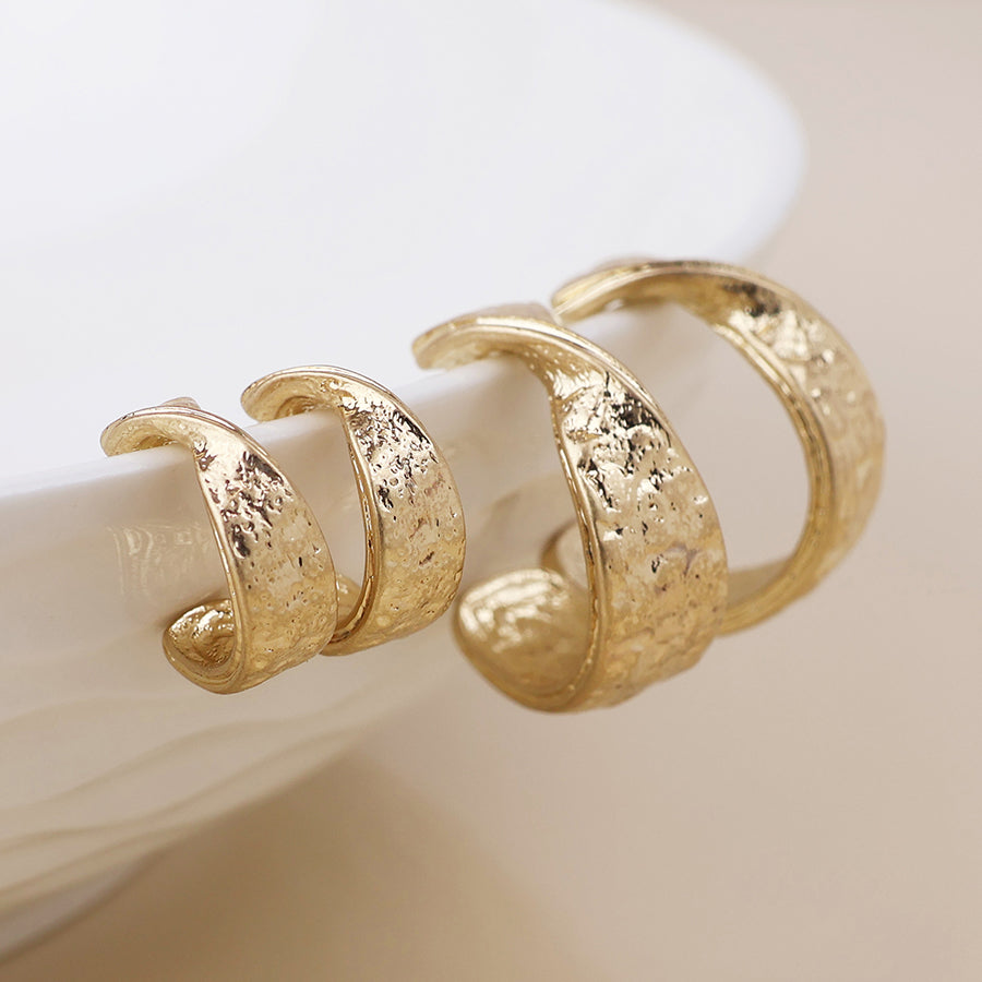 POM Molten golden worn textured twist hoop duo