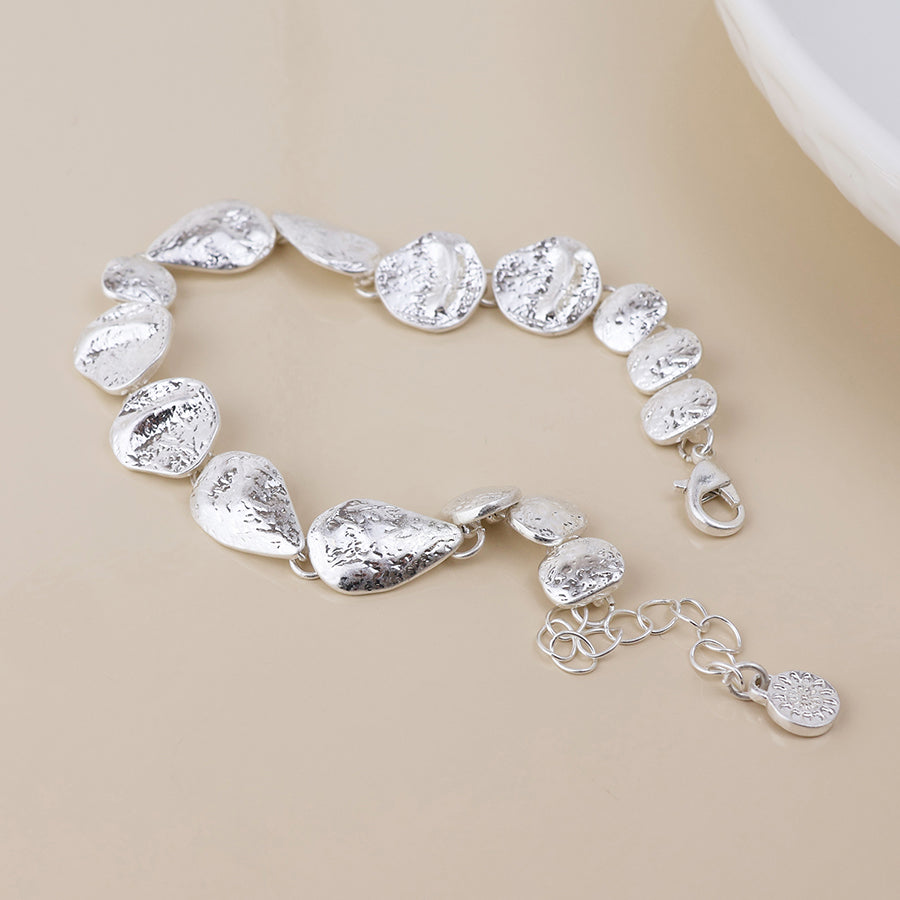 POM Molten silver plated molten organic worn drops bracelet
