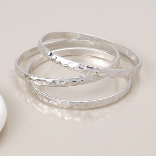 POM Silver plated worn triple bangle set