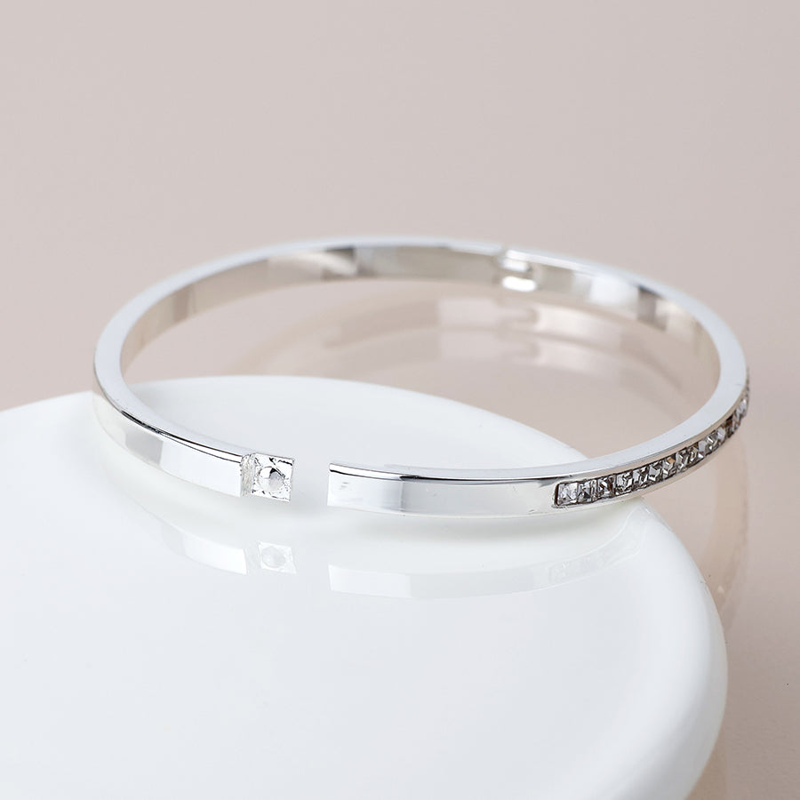 POM Silver plated clear crystals hinged bangle