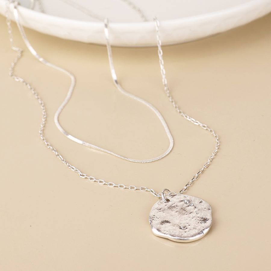POM Solstice worn silver plated textured disc layered chain necklace