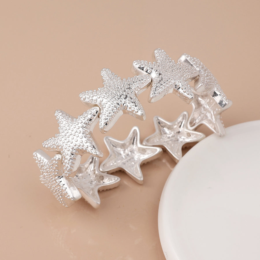 POM Silver plated starfish stretch bracelet