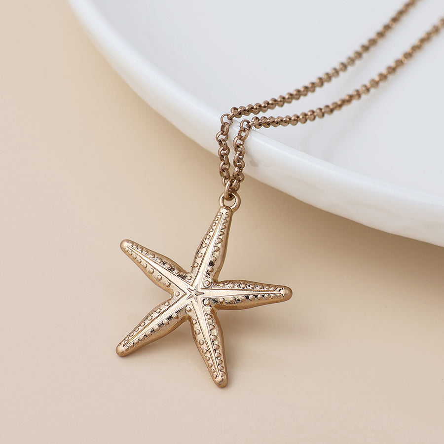 POM Golden starfish necklace