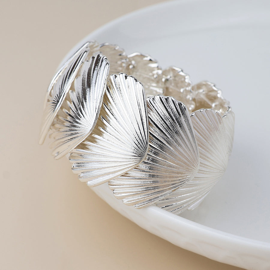 POM Silver plated stretch clam shell bracelet