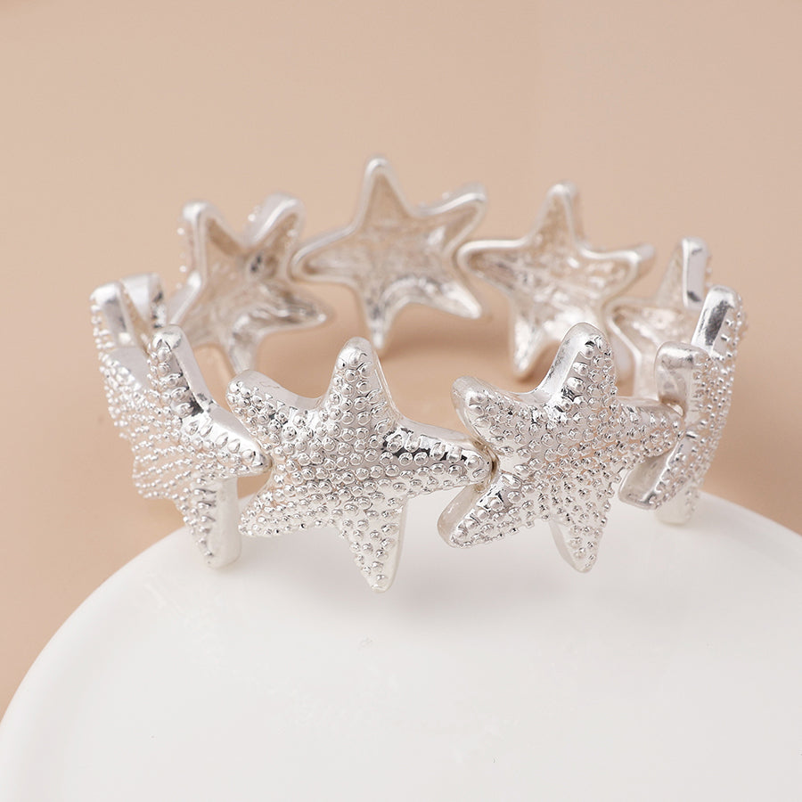 POM Silver plated starfish stretch bracelet